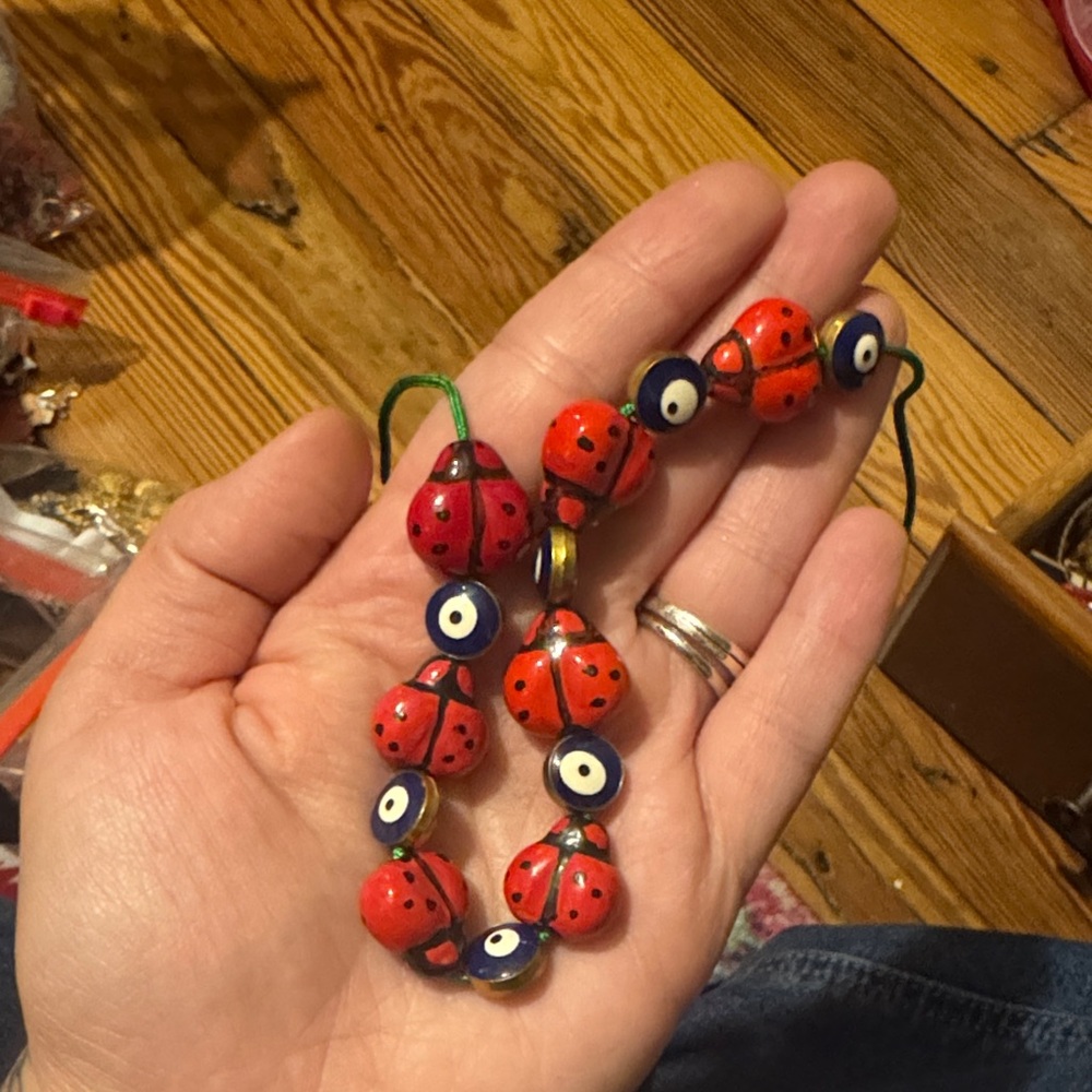 Evil eye and ladybug beads
